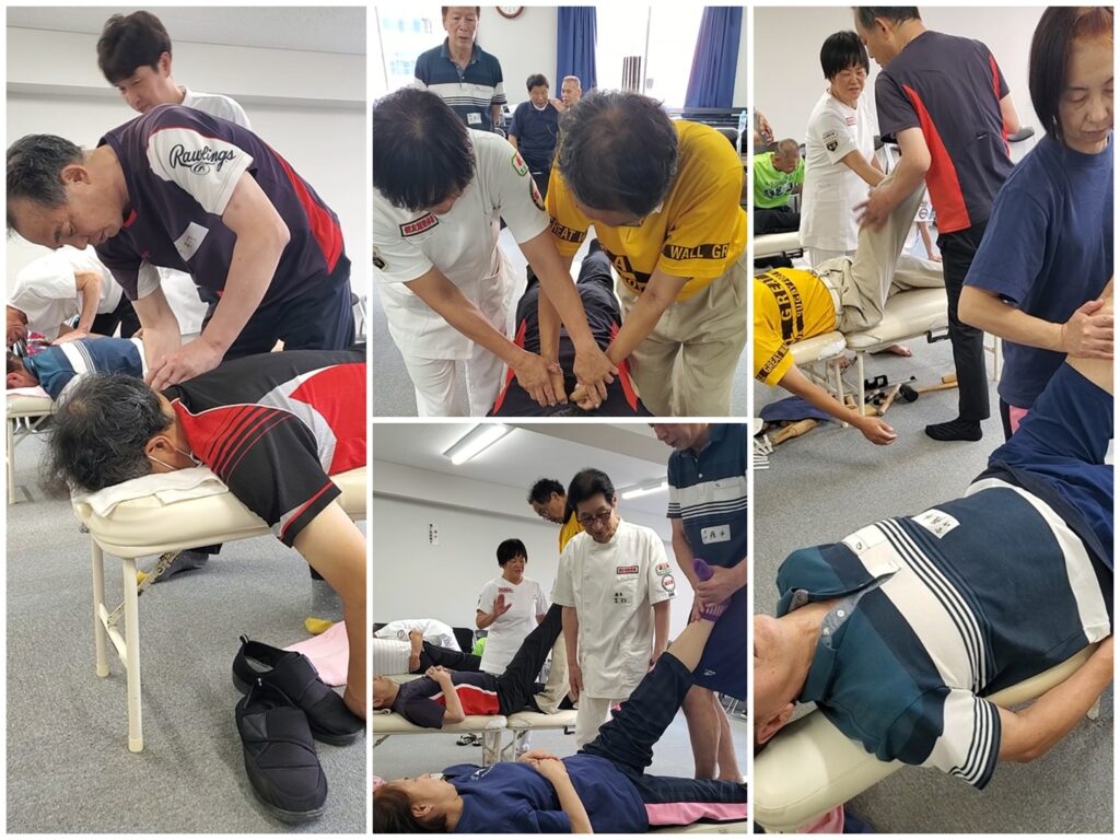 健友館整体師養成所の大阪市での出張実技講習会でマンツーマン指導する様子